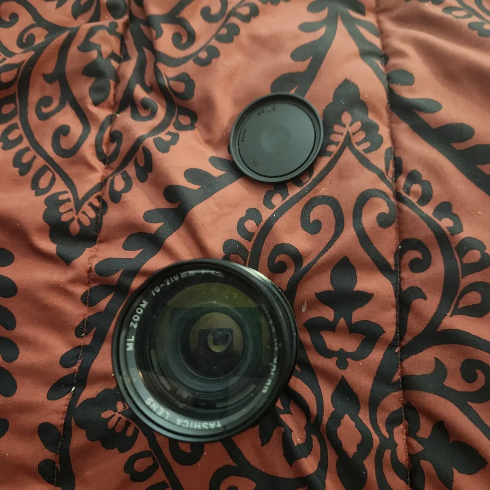 Yashica Black‎ Lens with Textured Grip and Precision Engineering